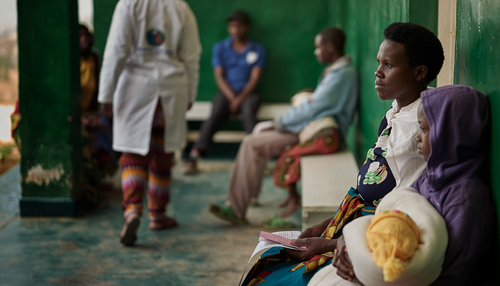 Young patients waiting outside hospital in Rwanda