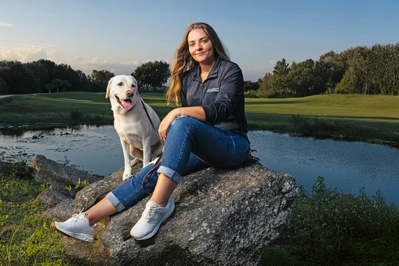 Kate Kostelyk and her Labrador dog