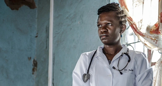 A female doctor looking in the distance