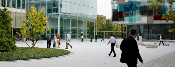 Business people walking on the Novartis Basel campus