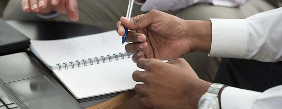 Close up of hands during a meeting