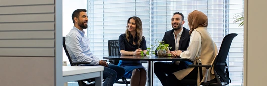 colleagues in office at table