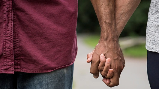 A couple holding hands