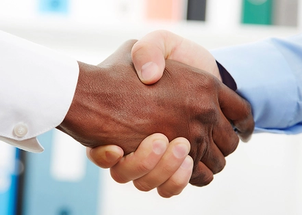 Two hands handshaking