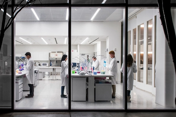 Scientists working in the lab at night