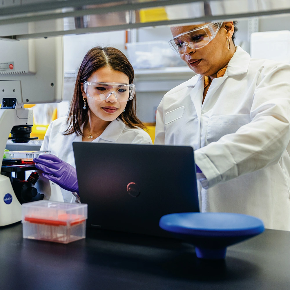 Two scientists working in a lab in East Hanover