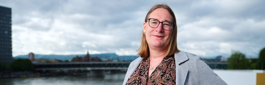A portrait of Stephie, Global Head of diversity, equity, and inclusion, responsible for disability equity at Novartis