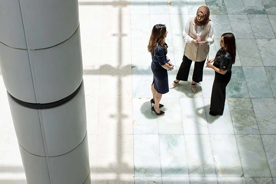 Three business women discussing